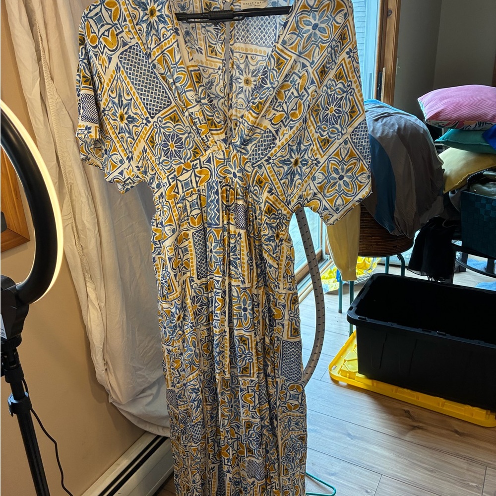 Dress Forum Blue and Yellow Geometric Floral V‑Neck Maxi Dress